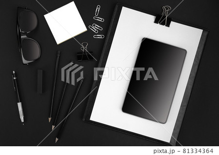 Office items on black background Office items on black background 81334364