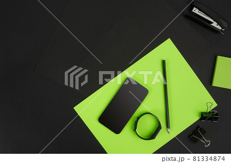 Top view of office supplies on blackboard background with copy space. Top view of office supplies on blackboard background with copy space. 81334874