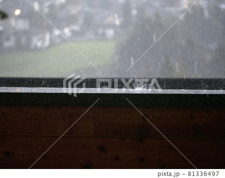 hailstorm on balcony in mountain hailstones while falling 81336497