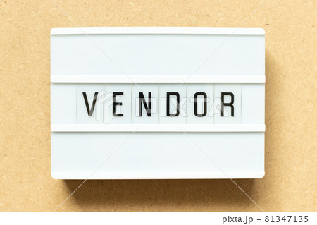 Lightbox with word vendor on wood background 81347135
