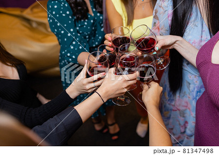 Clinking glasses with alcohol and toasting, party. Clinking glasses with alcohol and toasting, party. 81347498