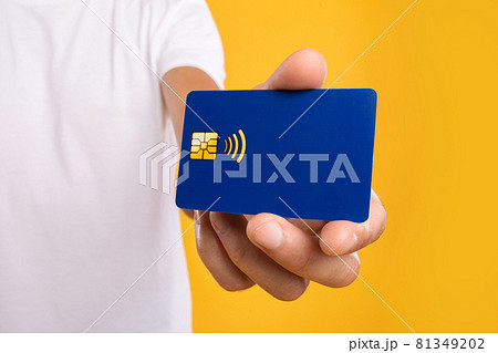 Close-up of man hand holding plastic credit card 81349202