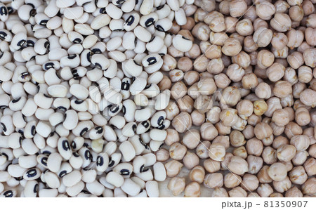 Spilled Black Eyed Peas and Chickpeas spilled on table 81350907