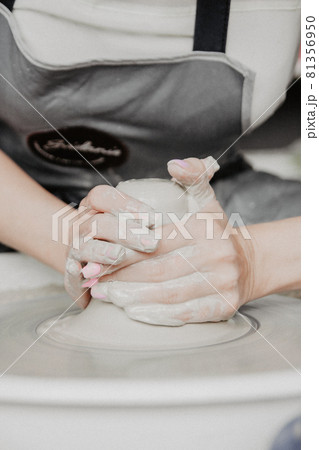 Top view of clay products, on a pottery wheel with copy space Top view of clay products, on a pottery wheel with copy space 81356950