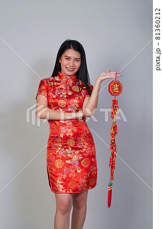 Beautiful young asian woman wearing wear chinese dress Beautiful young asian woman wearing wear chinese dress 81360212