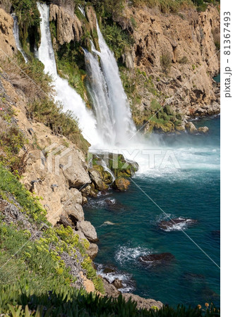 Lower Duden waterfall flowing into the Mediterranean Sea in Antalya Turkey 81367493