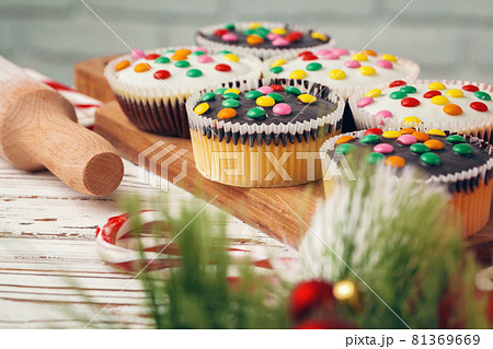 Beautiful composition of Christmas sweets with decorations Beautiful composition of Christmas sweets with decorations 81369669