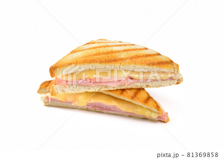 Pressed and toasted sandwich with ham and cheese on white background Pressed and toasted sandwich with ham and cheese on white background 81369858