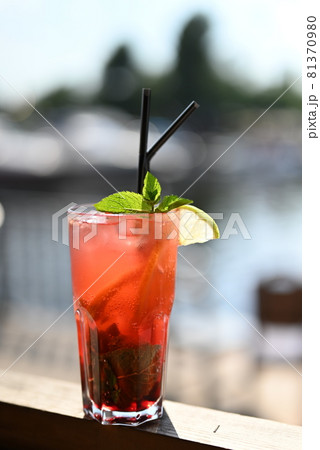 cocktail red lemonade mojito cold with mint in a restaurant cocktail red lemonade mojito cold with mint in a restaurant 81370980