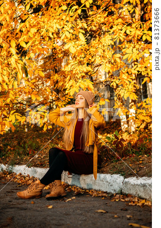 Alone Time, some time to yourself, me time for self-care and self-healing. Alone young woman enjoying life in the autumn park. Self Improvement Me Time Ideas Alone Time, some time to yourself, me time for self-care and self-healing. Alone young woman enjoying life in the autumn park. Self Improvement Me Time Ideas 81373666