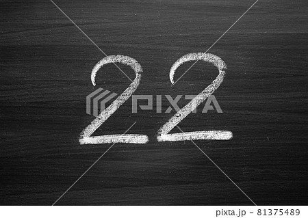 number twenty two enumeration written with a chalk on the blackboard 81375489