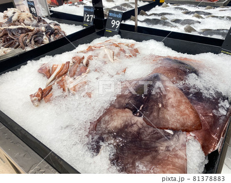 Tesco Lotus,THAILAND- August 25, 2021 : Variety of fresh meat, Fresh fish and seafood are placed in trays or on crushed ice, Fresh food products in famous department stores. Food in the mall. Tesco Lotus,THAILAND- August 25, 2021 : Variety of fresh meat, Fresh fish and seafood are placed in trays or on crushed ice, Fresh food products in famous department stores. Food in the mall. 81378883