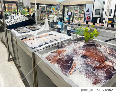 Tesco Lotus,THAILAND- August 25, 2021 : Variety of fresh meat, Fresh fish and seafood are placed in trays or on crushed ice, Fresh food products in famous department stores. Food in the mall. Tesco Lotus,THAILAND- August 25, 2021 : Variety of fresh meat, Fresh fish and seafood are placed in trays or on crushed ice, Fresh food products in famous department stores. Food in the mall. 81378902