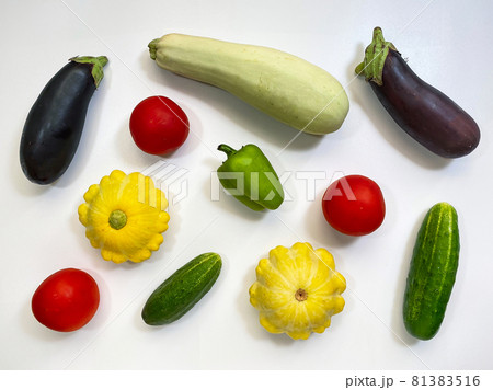 Set of vegetables isolated on a white background, eggplant, zucchini, tomatoes, peppers, cucumbers. Healthy food concept Set of vegetables isolated on a white background, eggplant, zucchini, tomatoes, peppers, cucumbers. Healthy food concept 81383516