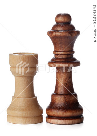 White and brown wooden chess pieces on white background White and brown wooden chess pieces on white background 81384343