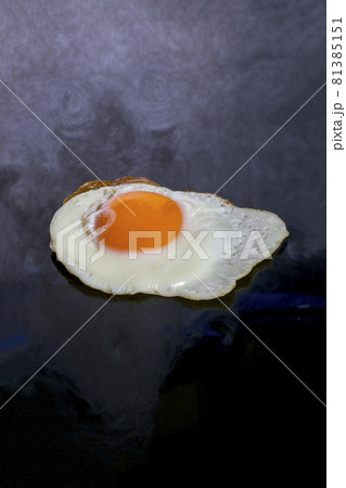 Still life with a roasted scrambled eggs on an abstract background 81385151
