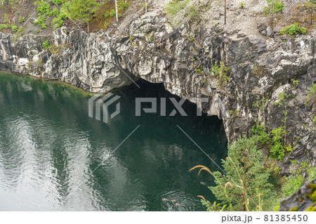 Marble rock water canyon. The marble deposits. Landscape rocks with reflection. Beautiful and majestic nature of the stones. 81385450