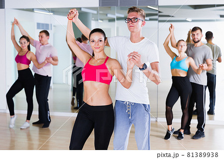 Positive dancing pair dance tango together Positive dancing pair dance tango together 81389938