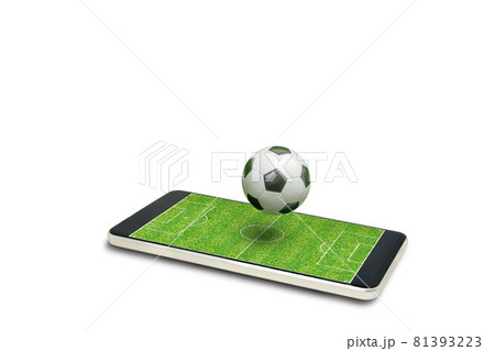 Soccer ball floating on green soccer field isolated on white background. Soccer ball floating on green soccer field isolated on white background. 81393223