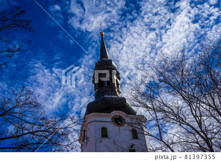 The tower of the St. Mary's Cathedral (Dome Church) in Tallinn on blue sky background with clouds. The tower of the St. Mary's Cathedral (Dome Church) in Tallinn on blue sky background with clouds. 81397355