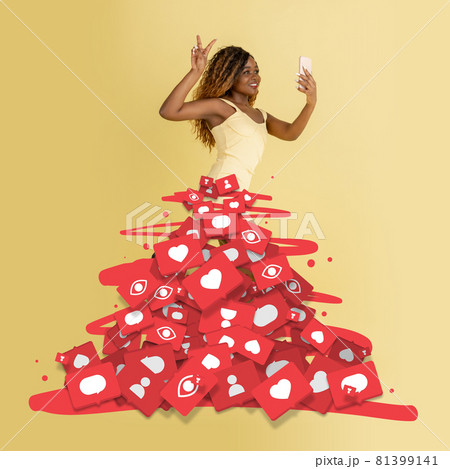 Contemporary art collage of wonam legs appearing from tablet with social media signs, likes icons 81399141