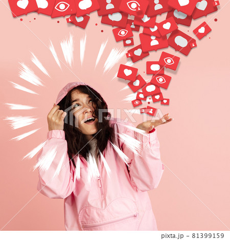Young beautiful girl and flying notificatons from her hand 81399159