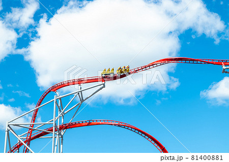 Roller Coaster in amusement park on blue sky background 81400881