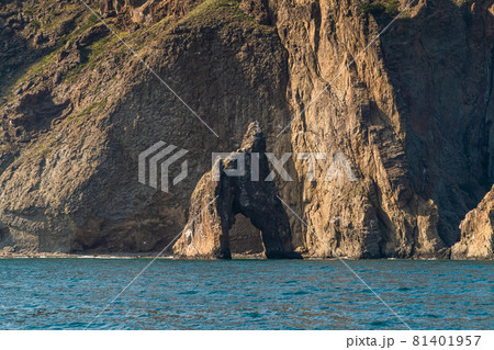 The Republic of Crimea. July 21, 2021. A picturesque view in sunny weather of the Golden Gate rock at the foot of the Kara-Dag mountain near the city of Koktebel. 81401957