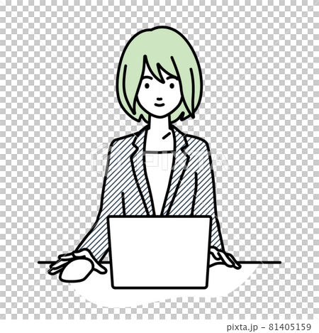 A woman in a suit sitting at a desk and using a PC A woman in a suit sitting at a desk and using a PC 81405159