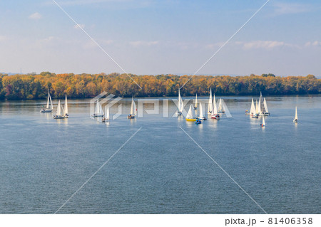 Yachts at sailing regatta on the Dnieper river in Kremenchug, Ukraine 81406358