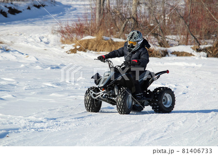 Child With His Quad in Winter 81406733