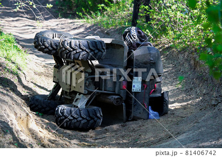 A quad on its side after it has been accidentally flipped 81406742