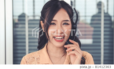 Video call camera view of businesswoman talks actively in videoconference 81412363