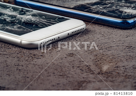 Mobile smartphone with broken screen close up 81413810