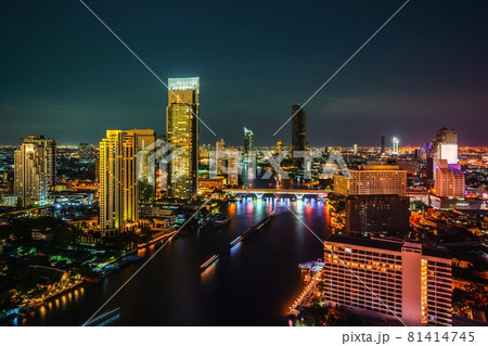 Night cityscape and high-rise buildings in metropolis city center 81414745