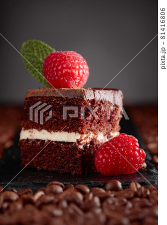 Closeup of chocolate cake with raspberry . Closeup of chocolate cake with raspberry . 81416806