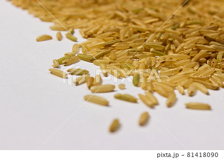 Brown rice isolated on the white background 81418090