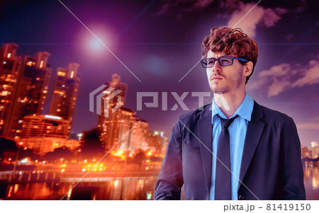 One Casual white Business man standing with determining face on a modern Bangkok city red background. One Casual white Business man standing with determining face on a modern Bangkok city red background. 81419150