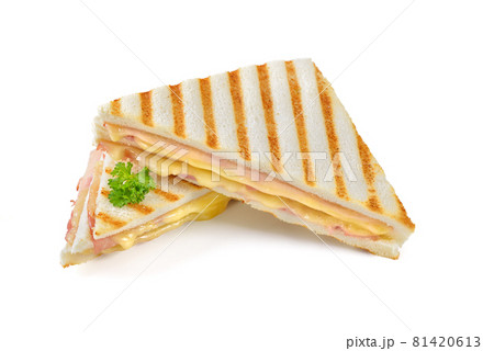 Pressed and toasted double sandwich with ham and cheese on white background 81420613