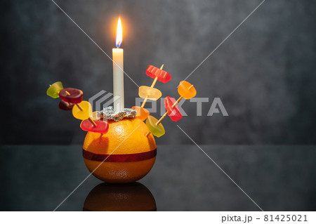 Orange Christingle is a symbolic object used in the Advent, Christmas and Epiphany services of many Christian denominations Orange Christingle is a symbolic object used in the Advent, Christmas and Epiphany services of many Christian denominations 81425021