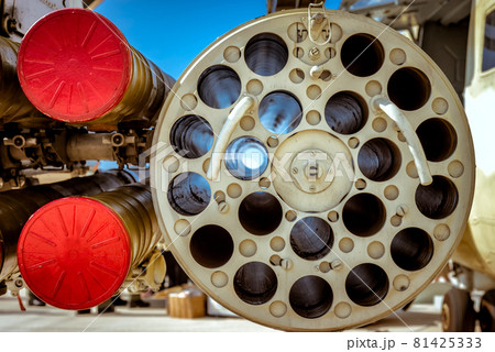 Closeup of rocket launchers of a military helicopter 81425333