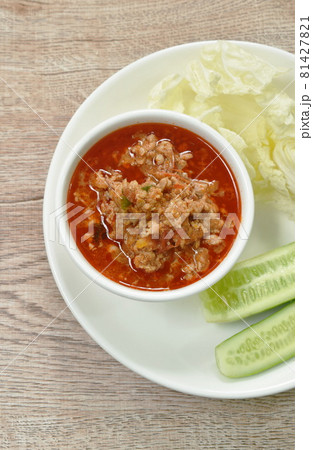 spicy chop pork with tomato and chili sauce Thai northern food  dipping fresh vegetable 81427821