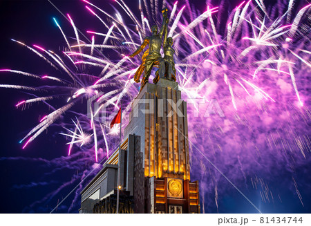Celebratory colorful fireworks and soviet monument Rabochiy i Kolkhoznitsa ( Worker and Kolkhoz Woman or Worker and Collective Farmer) of sculptor Vera Mukhina, Moscow, Russia. Made of in 1937 Celebratory colorful fireworks and soviet monument Rabochiy i Kolkhoznitsa ( Worker and Kolkhoz Woman or Worker and Collective Farmer) of sculptor Vera Mukhina, Moscow, Russia. Made of in 1937 81434744