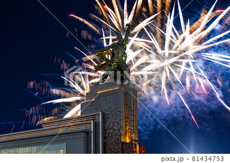 Celebratory colorful fireworks and soviet monument Rabochiy i Kolkhoznitsa ( Worker and Kolkhoz Woman or Worker and Collective Farmer) of sculptor Vera Mukhina, Moscow, Russia. Made of in 1937 81434753