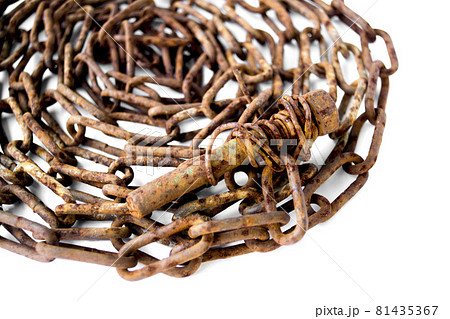 old rusty screw lies on an old rusty chain. old rusty screw lies on an old rusty chain. 81435367