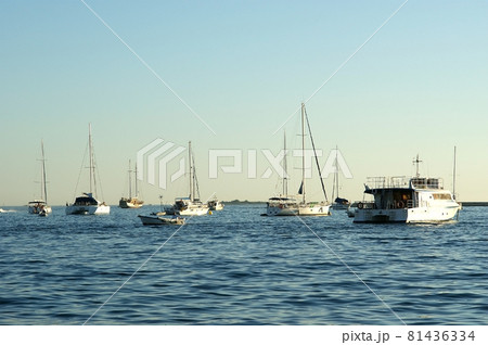 View of the sea and a yacht in sunset time View of the sea and a yacht in sunset time 81436334