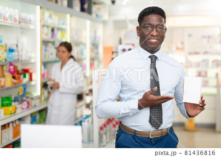 Man holding drug package Man holding drug package 81436816