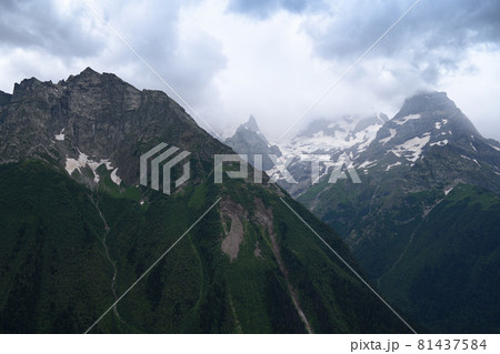 Mountain landscape with dramatic sky 81437584