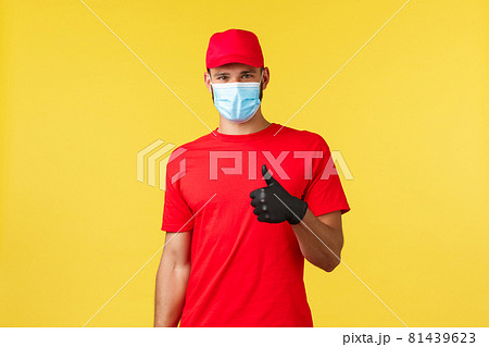 Express delivery during pandemic, covid-19, safe shipping, online shopping concept. Courier provide excellent and fast mail delivery or shipping, show thumb-up, encourage call their service company Express delivery during pandemic, covid-19, safe shipping, online shopping concept. Courier provide excellent and fast mail delivery or shipping, show thumb-up, encourage call their service company 81439623