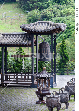 NEW TAIPEI CITY, TAIWAN - JANUARY 27, 2012:  Buddhist ringing bell at Guan Dao Guan Ying Temple 81451126